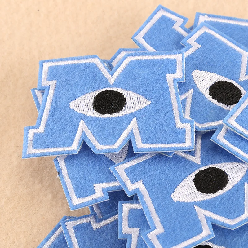 50pcs/Lot Embroidery Patch Letter Clothing Decoration Accessories M Eye Blue Strange Things Diy Iron Heat Transfer Applique