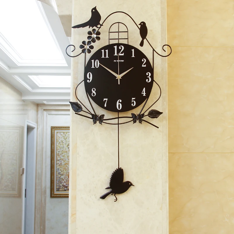 

wall clock living room creative bird wall clock personality modern decorative wall watch simple atmosphere swing mute clock