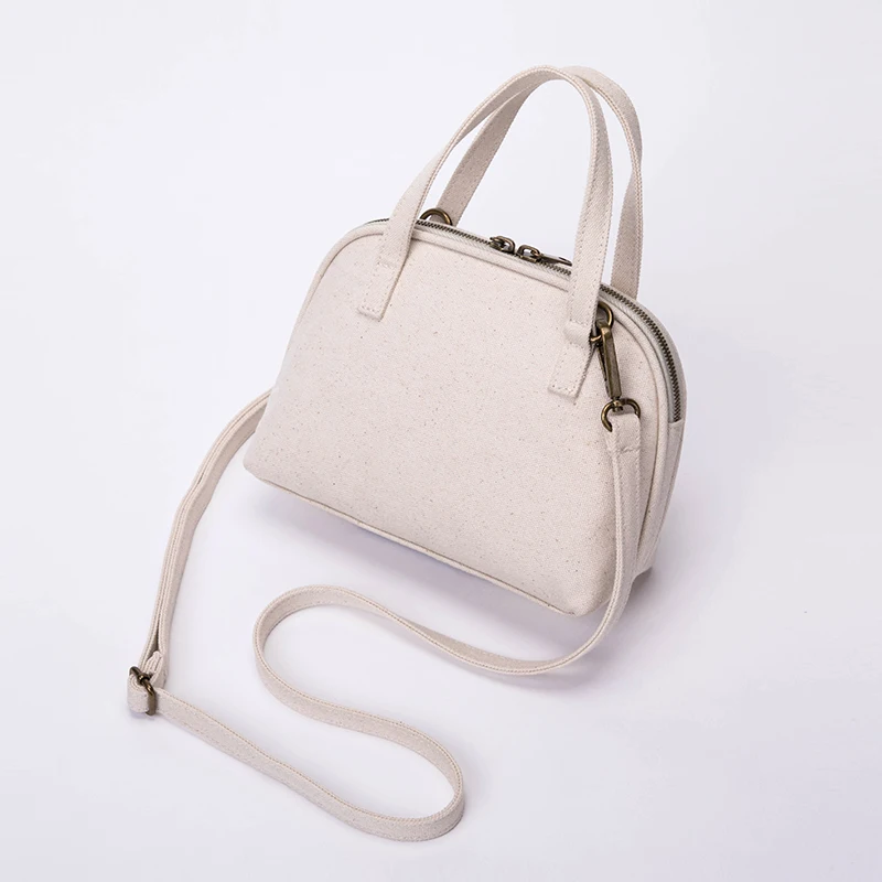 

High-end foreign style mini canvas shell bag ins messenger wild handbag