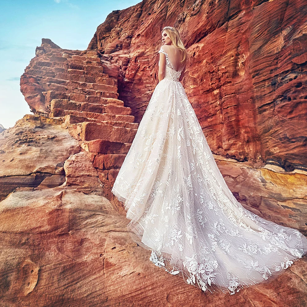 Vestido De novia De lujo con Espalda descubierta, traje De novia con manga De casquillo, apliques De tul, Vestido De novia