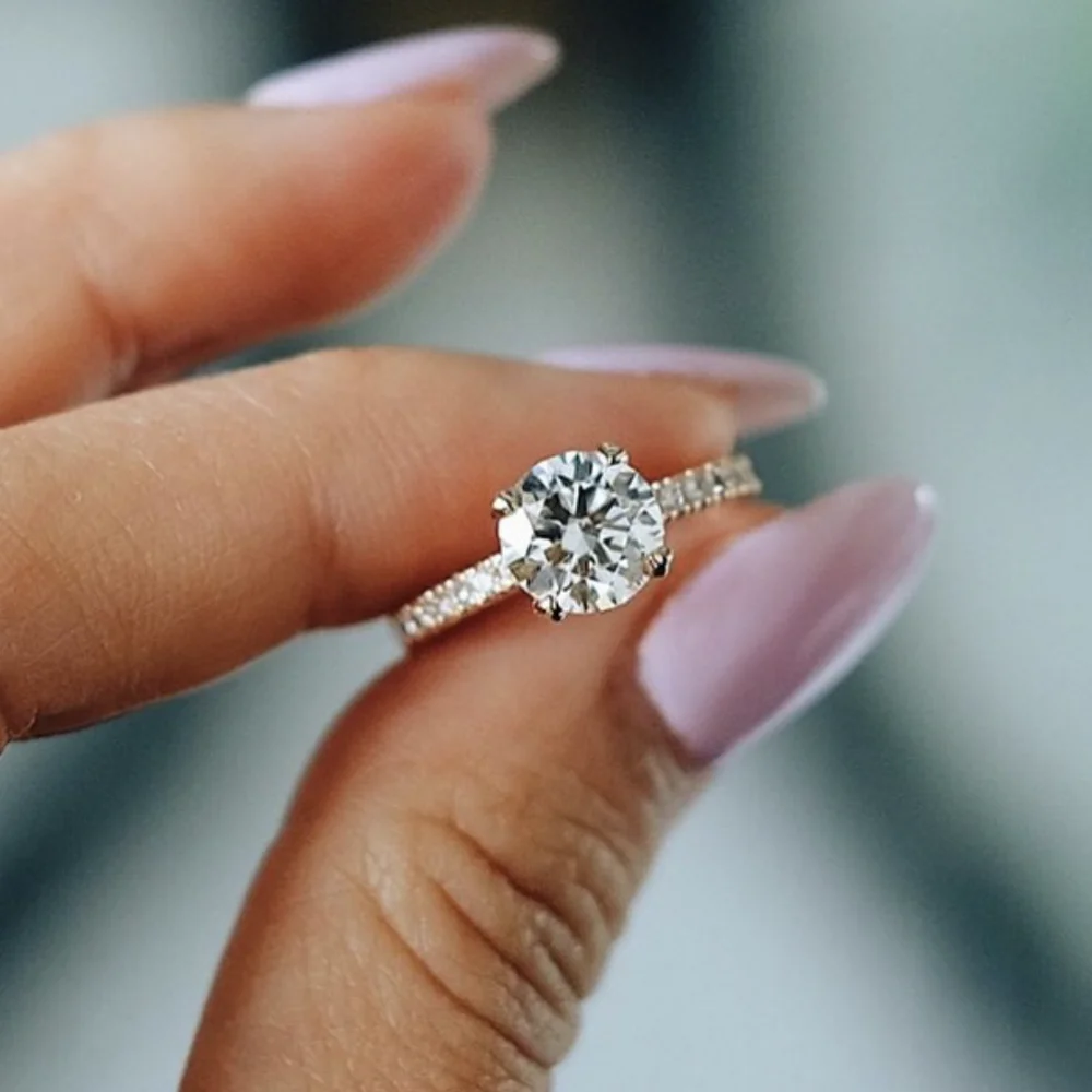 

Женское кольцо из серебра 925 пробы, с четырьмя закрепками