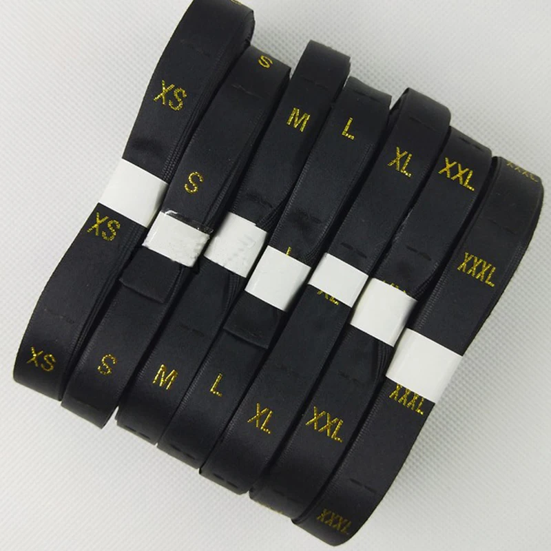 500pcsGARMENT SIZE LABEL Clothing Tags White Black Background Wooden Lock Machine Metal Gold Letters 1.2x3.5cm High Quality