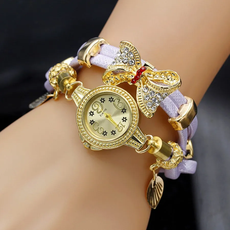 Shsby Fashion Women Rhinestone Watches Ladies Rope Strap Gold Alloy Bowknot Bracelet Quartz Wristwatches Women Dress Watches