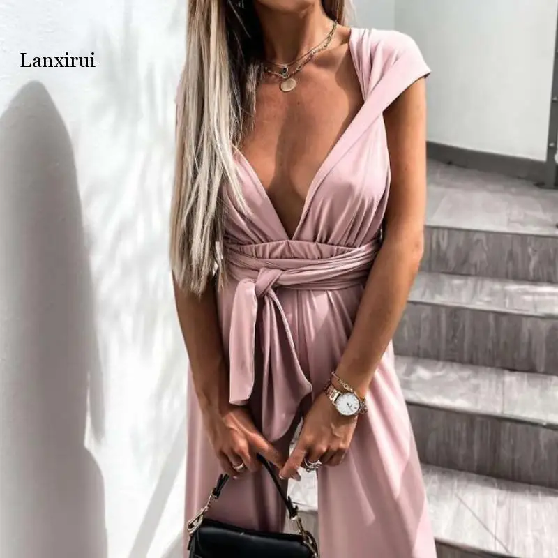 2021 lato elegancki solidna V Neck kombinezon kobiety Sexy bez rękawów kombinezon z odkrytymi plecami moda damska bandaż pas szerokie nogawki Playsuits