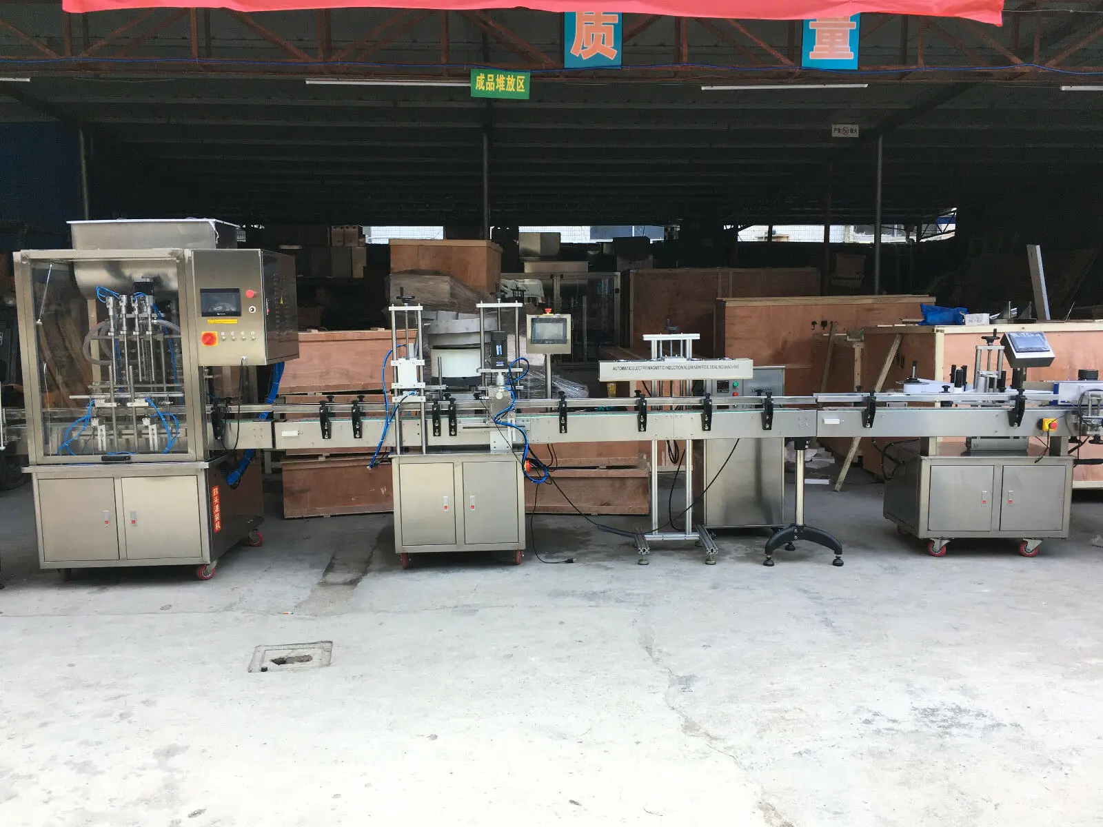 Automatic Liquid Filling Pluging Capping Labeling Machine with Bottle feeders By Sea