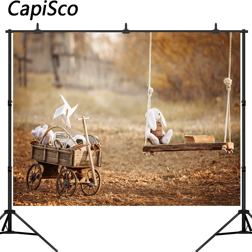 

Capisco Photography Background Children's toys on a swing in the garden summer day Backdrops for Photo Studio props