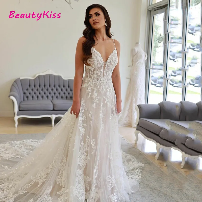 Abiti da sposa in pizzo bohémien Appliques con scollo a v cinturino per Spaghetti A-Line abito da sposa da spiaggia Plus Size abiti da sposa principessa