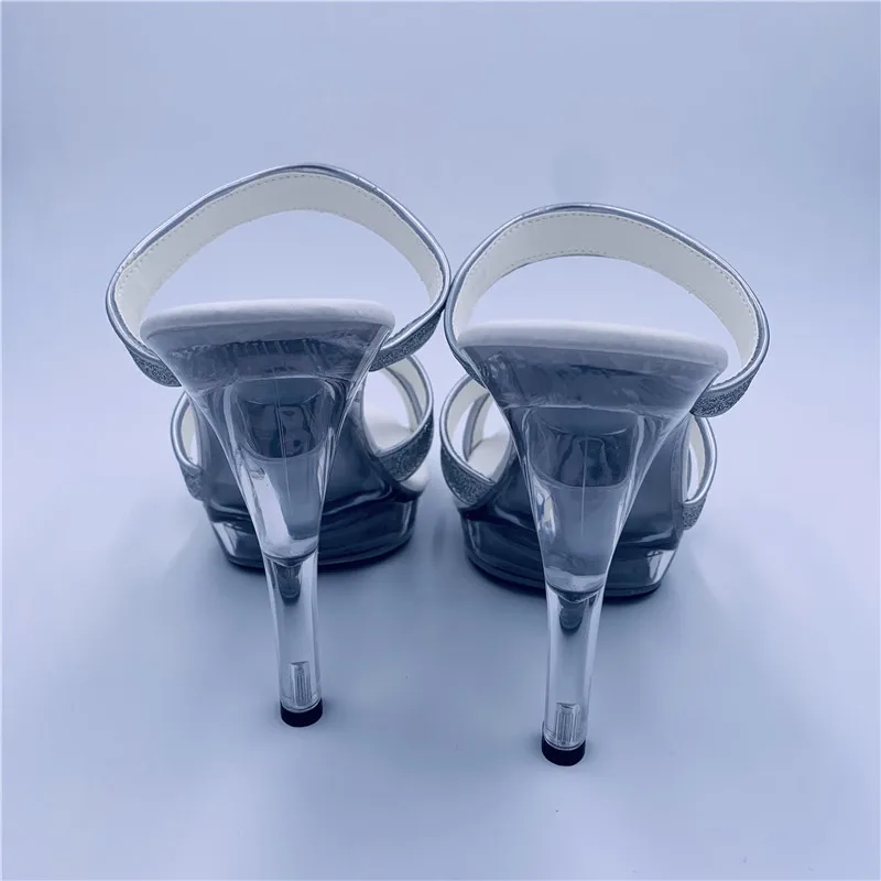 Models walk the stage in sexy silver sequined heels and nightclub chic 13cm high-heeled sandals