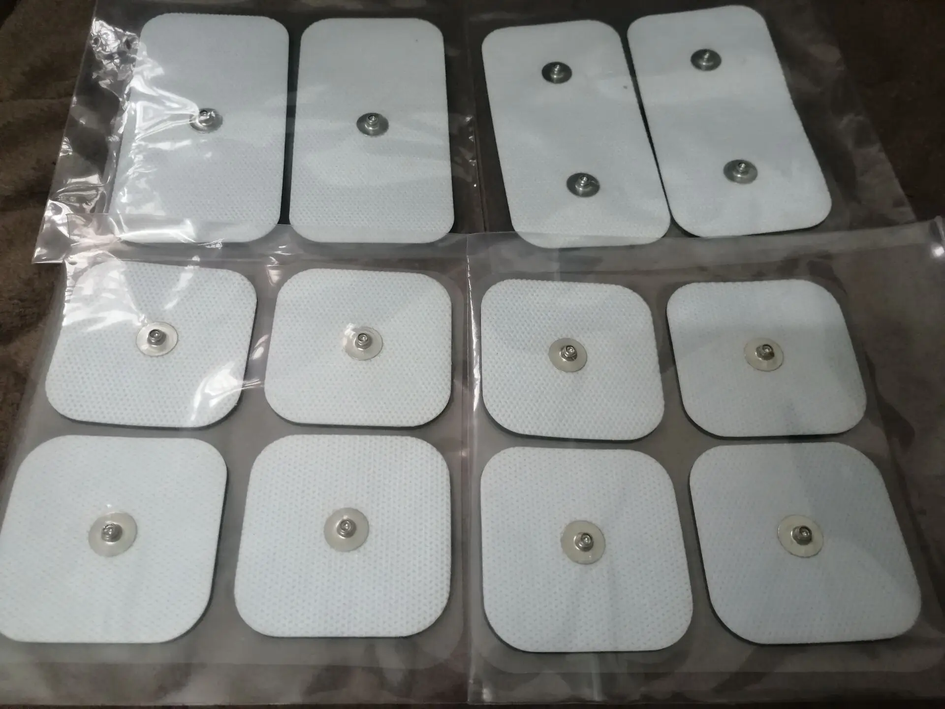 COMPEX 패드로 효과적인 전기 자극 치료를 경험하세요: 18개 세트 실용적인 교체 전극 패드 리뷰