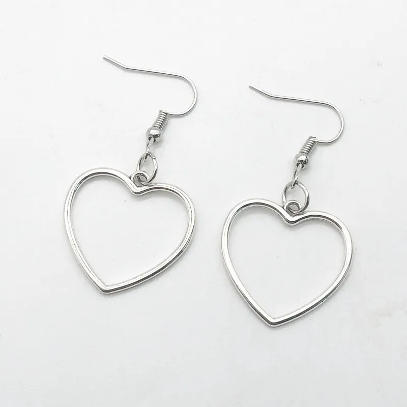 

Simple Design Silver Color Hollow Heart Drop Earrings For Women New Brand Fashion Ear Cuff Piercing Dangle Earring Gift