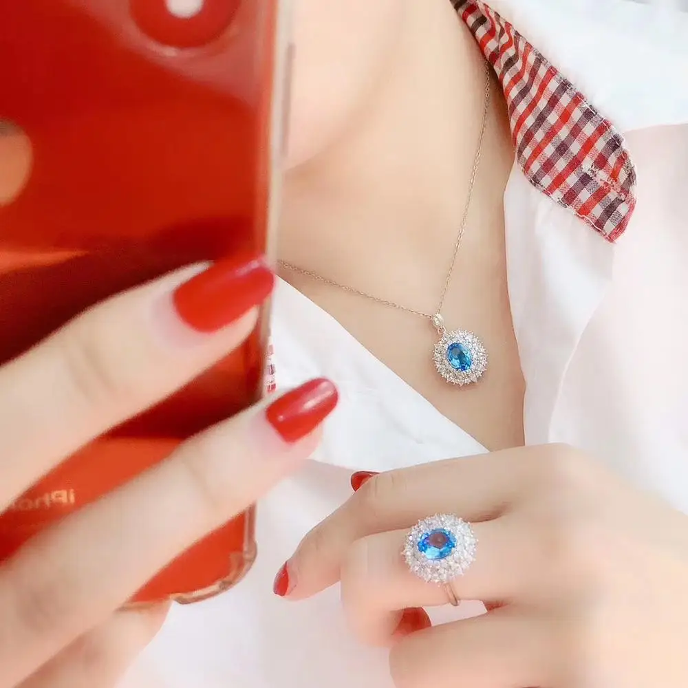 مجوهرات بوتيك KJJEAXCMY من الفضة الإسترليني عيار 925 مرصعة بالتوباز الأزرق الطبيعي قلادة خاتم بدلة دعم كشف فاخر