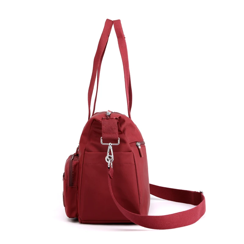 Bolso de mano con asa superior para mujer, bandolera de nailon de alta calidad, para viaje, novedad de 2024