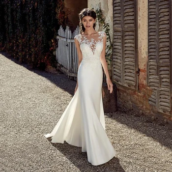 งานแต่งงาน Boho ภาพเซ็กซี่แขนกุดคอตัก Appliqued Lace Mermaid Gowns แต่งงานชุดเจ้าสาว Custom Made