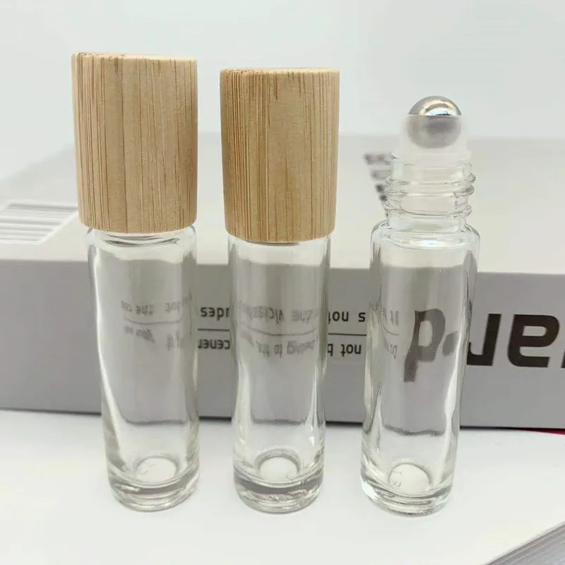 

10/30/50pcs Clear Roll On Glass Bottle Empty Fragrance Perfume Essential Oil Bottle 10ML Roll-On Bamboo Cap Bottle