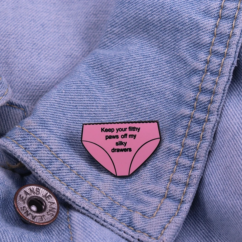 Grease quote pin badge