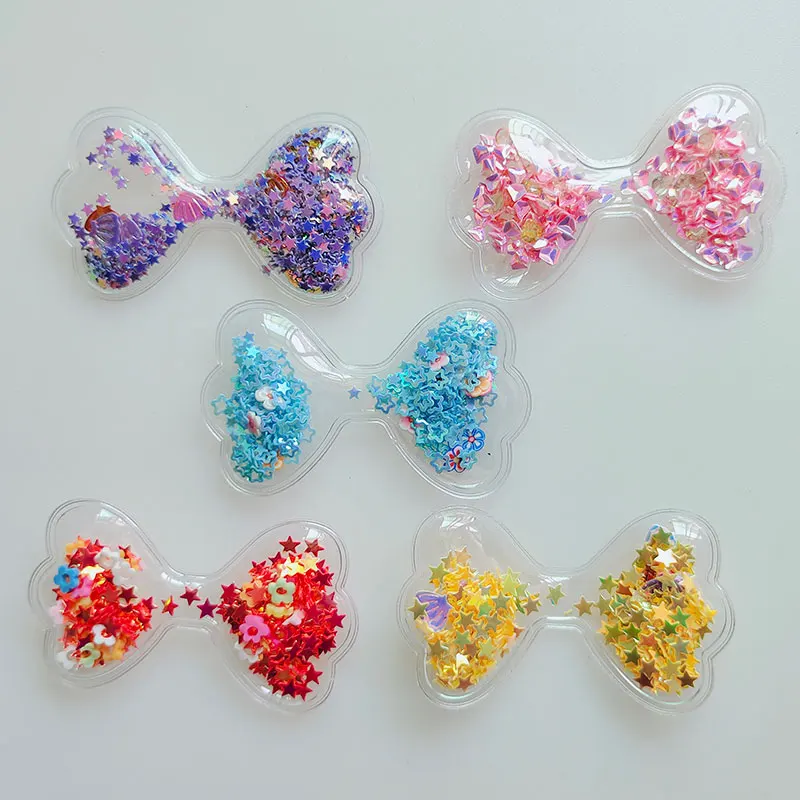 20pcs Quicksand Bow PVC trasparente con applicazioni glitterate per accessori per Clip per bambini fai-da-te