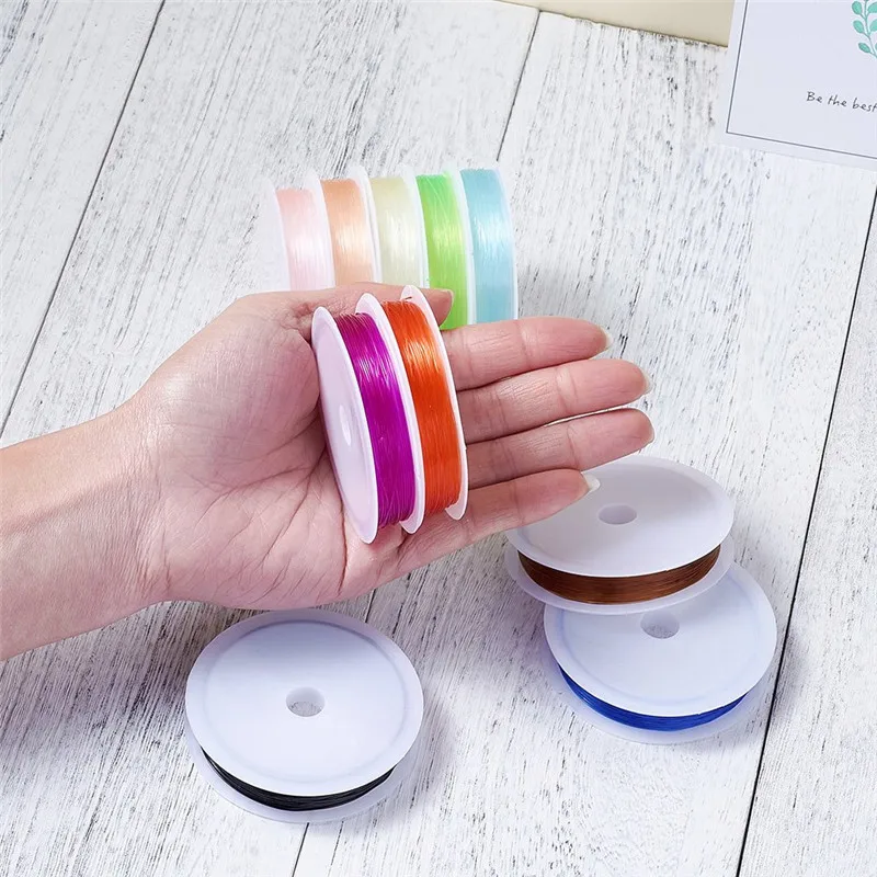 10 Rolll okrągły elastyczny linka z kryształami rozciągliwe sznury 0.5/0.6/0.7/ 0.8mm do tworzenia biżuterii bransoletka z paciorkami akcesoria Mix