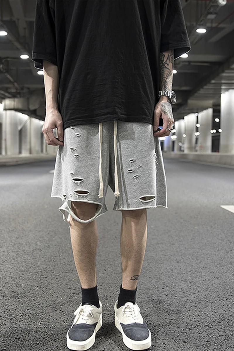 High street wind hole knife cut hem raw edge cotton shorts hip-hop style solid color wild summer skateboarding pants men