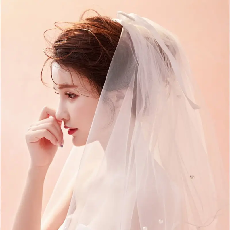 ชุดแต่งงาน Tulle Veils Ivory Bowknot เจ้าสาว Multi Layer ผมหวี Veil Faux ไข่มุกเจ้าสาว Fairy แต่งงานอุปกรณ์เสริม