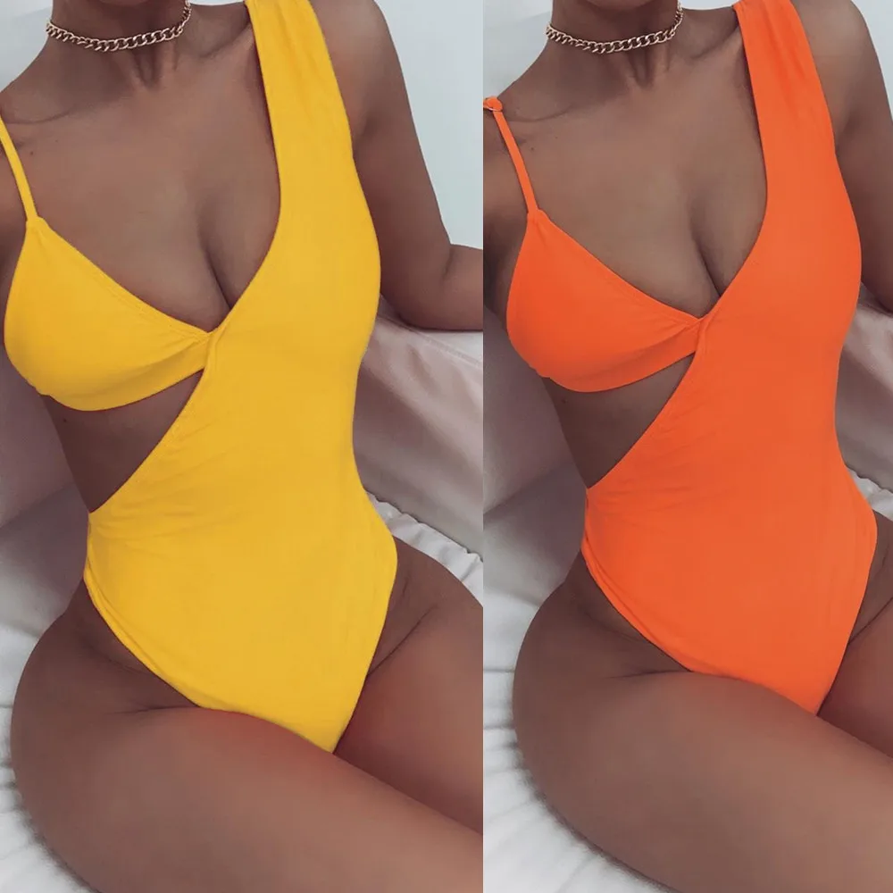 BKLD Backless Della Tuta Delle Donne Senza Maniche Solid 2020 Della Spiaggia di Estate Della Cinghia di Spaghetti Hollow Out Tuta Con Scollo A V Body Slim Tuta Del Pagliaccetto