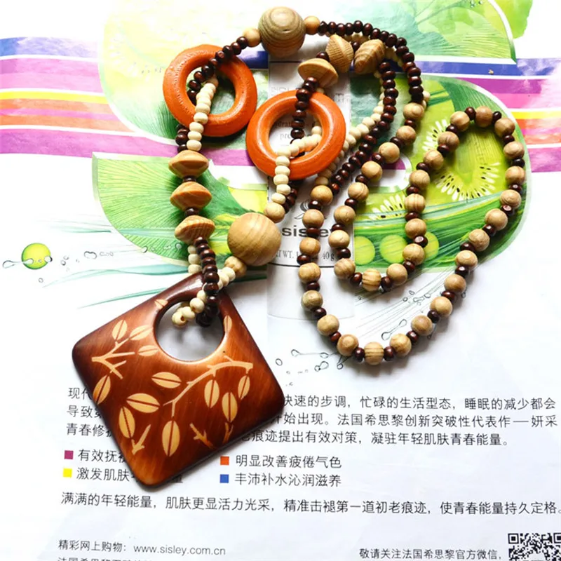 Magic Sun lines Hand Carved Exotic Hollow Round Woody Beaded Pendant Necklace Fashion Jewelry for Women Birthday Gift Present