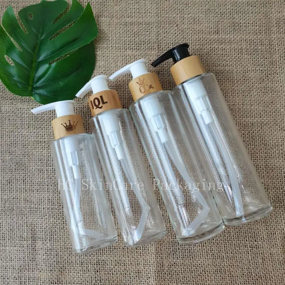 Wholesale Beauty Lotion Bamboo Wood Pump Lid Bottles Clear Glass Facial Care Containers Packaging Bottles Cosmetic Spray Bottles