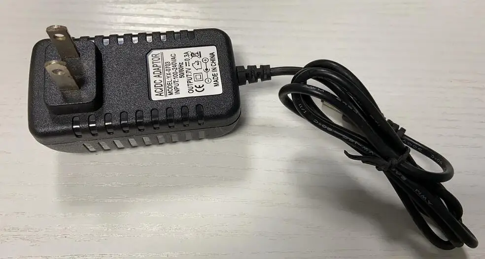 AC100- 110V 220V 240V input 7V DC 300mA 0.3A adapter power supply battery charger 5.5/2.5MM head YX-0703