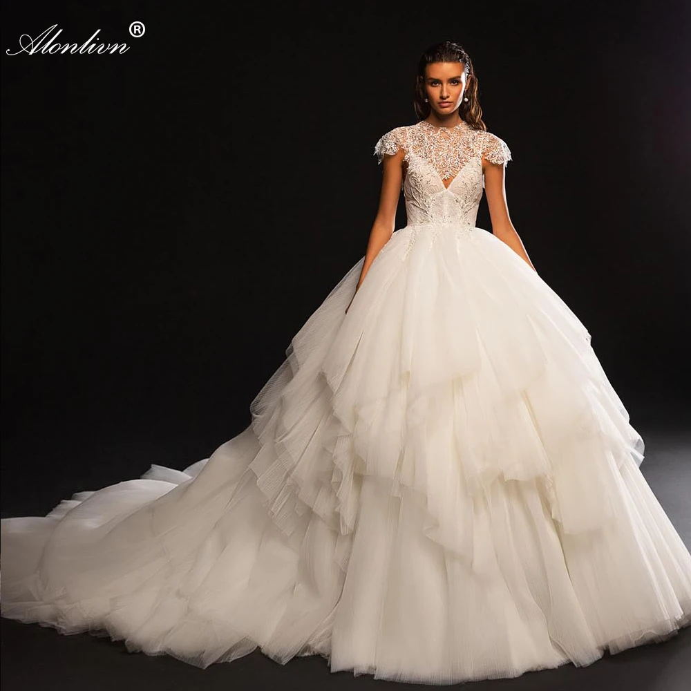 

Alonlivn Lustrous Ruffled Tiered Silky Tulle Ball Gown Wedding Dresses Beading Pearls Spaghetti Straps Bridal Gowns With Jacket