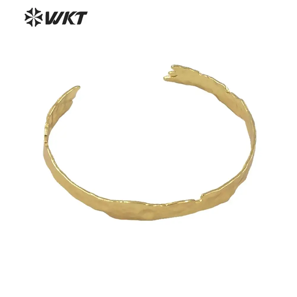 

WT-B560 WKT most popular irregular metal brass women bangle is open size Tiny simple gold electroplated lava bangle