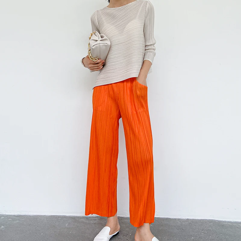 The new spring/summer/fall  Miyake pleated plain color all-match slimming commuter casual day line nine minute pants