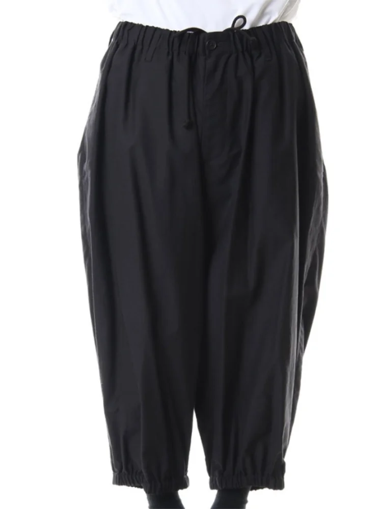 

The new men's casual pants for spring are black wide-leg pants with loose elastic-waist straps