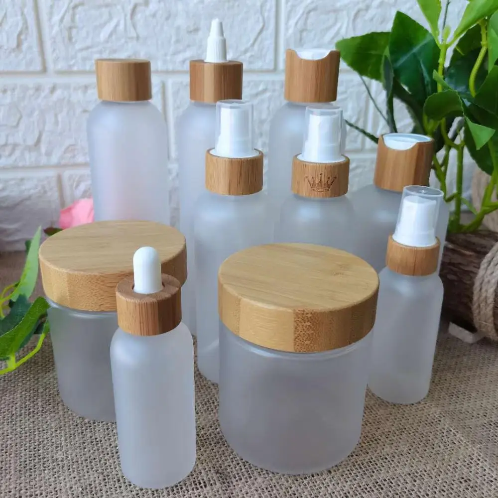 

Frosted glass emulsion spray bottle Perfume bottles Skincare cream jar Mask Cosmetic packaging containers with wooden bamboo cap
