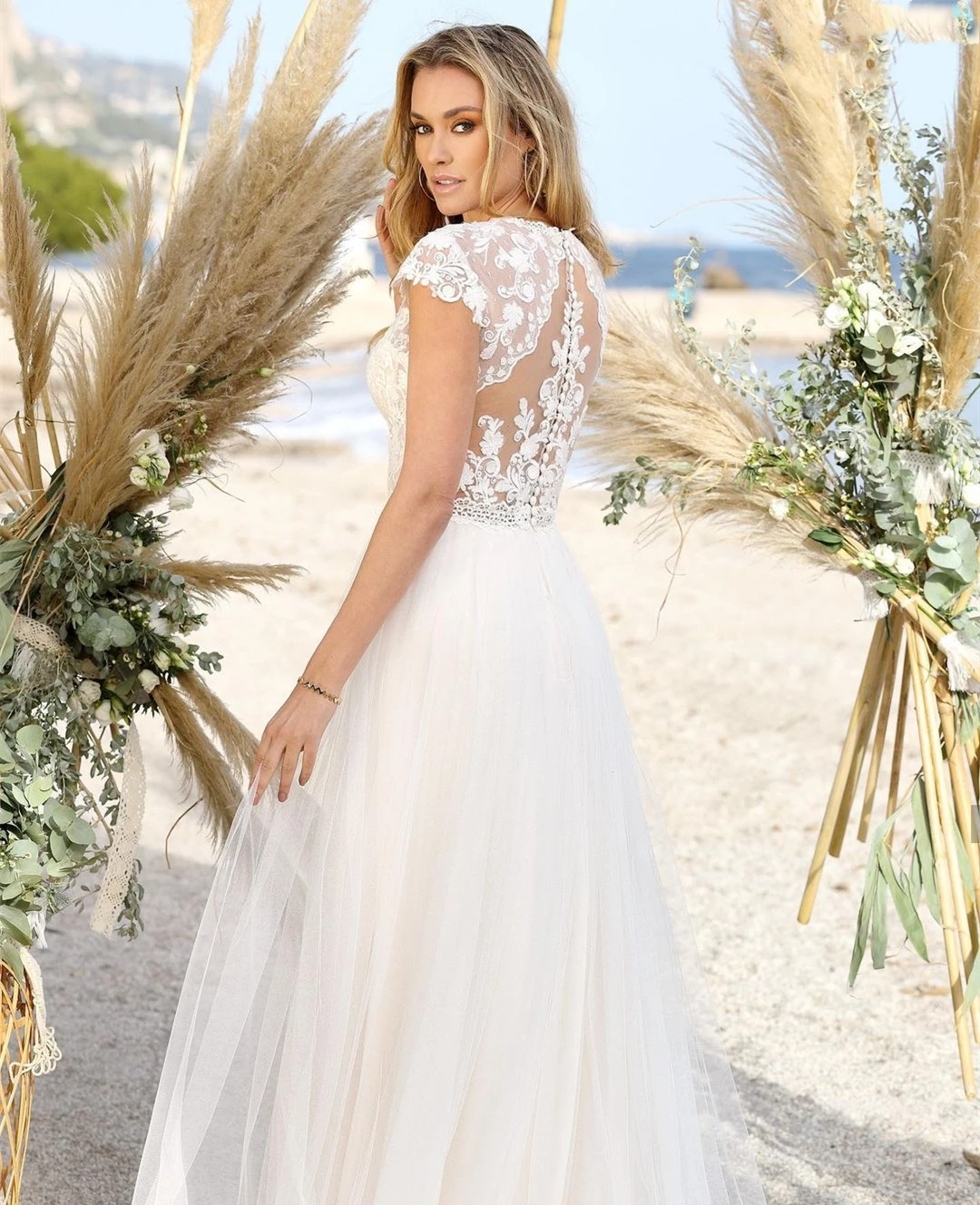 A-Line Bohemian Beach Abito da sposa O-Collo Manica ad aletta Applicazioni in pizzo Tulle Abito da sposa senza maniche Abiti da sposa Personalizzato