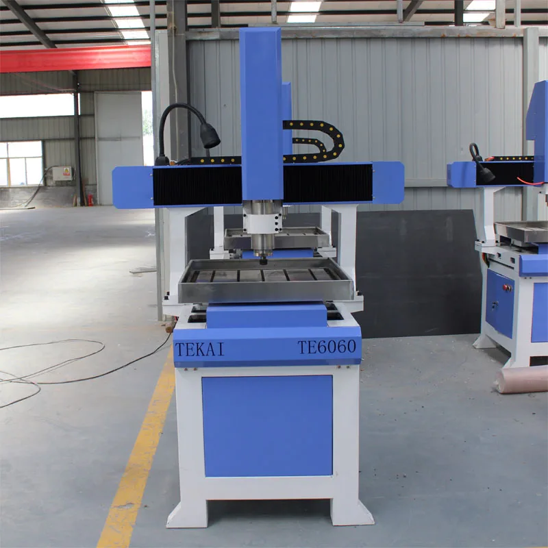 simple engraving machines Jinan TEKAI plastic cutting and engraving cnc machine cnc router 6060 for wood art craft