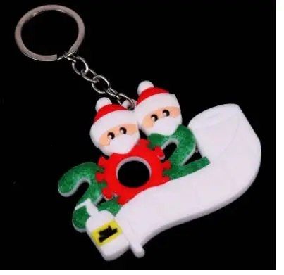 100pcs/lot fashioncreative style 2020 unisex pvs santa with mask keychain female male christmas key ring