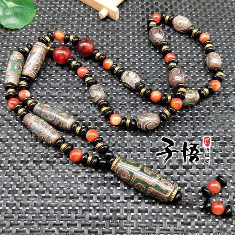 Factory direct supply Tibet Pan-green antique old agate black and white nine-eyed Dzi Beads necklace sweater chain pendant