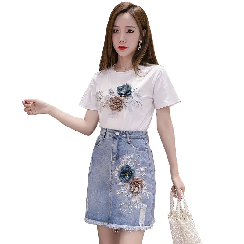 

2023 New Summer New Short sleeve T Shirt And embroidered Hole Skirt 2pcs Set Women's Two piece Set Casual Skirt Suits R1105