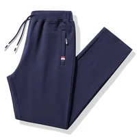 Pantalones de otoño para hombre, ropa deportiva para Fitness, chándal con cintura elástica, pantalones de algodón, pantalones sueltos para gimnasio, pantalones de chándal para correr para hombre M- 8XL