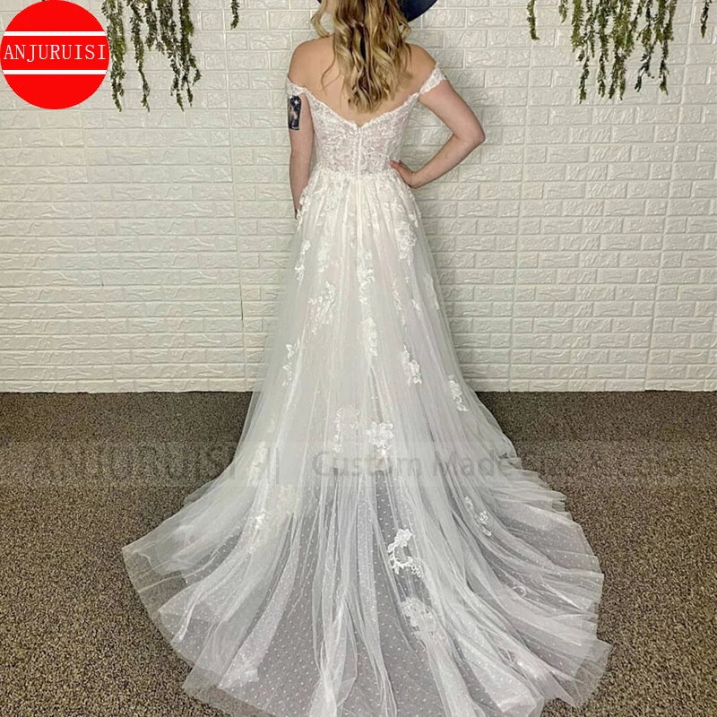 Vestido de novia de tul estilo bohemio, traje de novia con escote en V, hombros descubiertos, Espalda descubierta, hasta el suelo Apliques de encaje, cola de barrido, hecho a medida