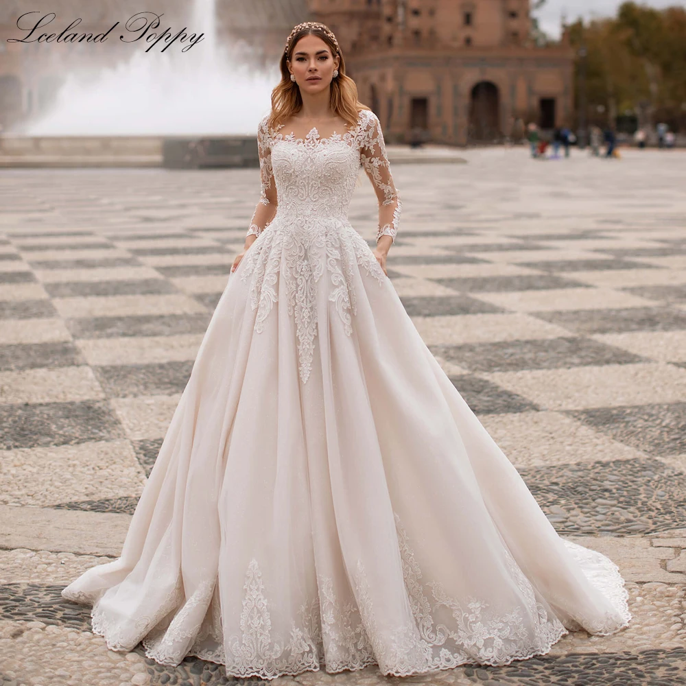 

Lceland Poppy A Line Scoop Neck Lace Appliques Wedding Dresses Long Sleeves Pearls Beaded Bridal Gowns with Chapel Train