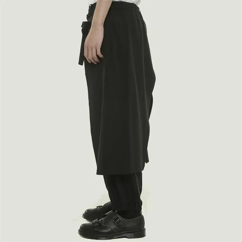 Men's new singer stage style catwalk winter new dark men's nine cropped trousers irregular overlay loose skirt slacks
