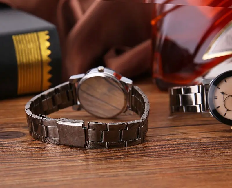 Montre décontractée à la mode pour hommes et femmes, fourniture coréenne de marque haut de gamme avec ceinture en acier, montres de table d'étudiant pour amoureux