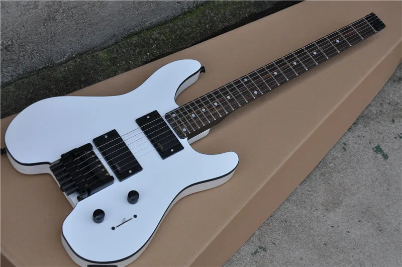 Eagle. Butterfly, electric guitar, electric bass, custom instrument shop .Headless Electric Guitar Steinberg White Guitar