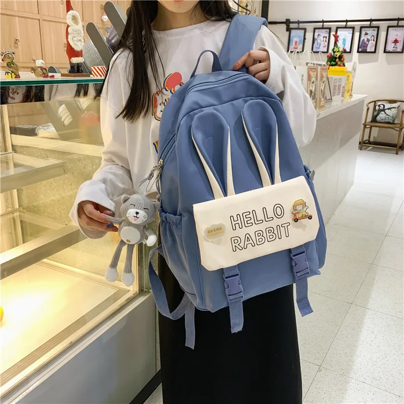 2021 Summer Nylon Backpack Female Cute Rabbit Ears Kawaii Children's School Bag with Doll Pendant 6 Colors 20-35L