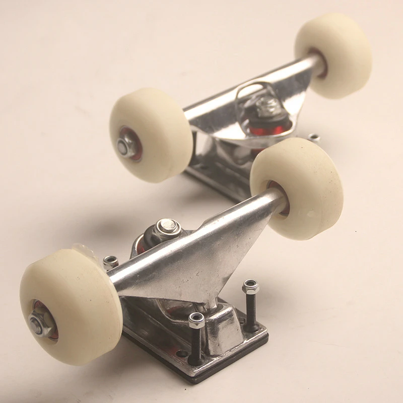 อะลูมินัมอัลลอยรถบรรทุกสเก็ตบอร์ด2ชุดสเก็ตอุปกรณ์เสริมยาว Mini Cruiser สี่ล้อสเก็ตบอร์ดล้อยาง