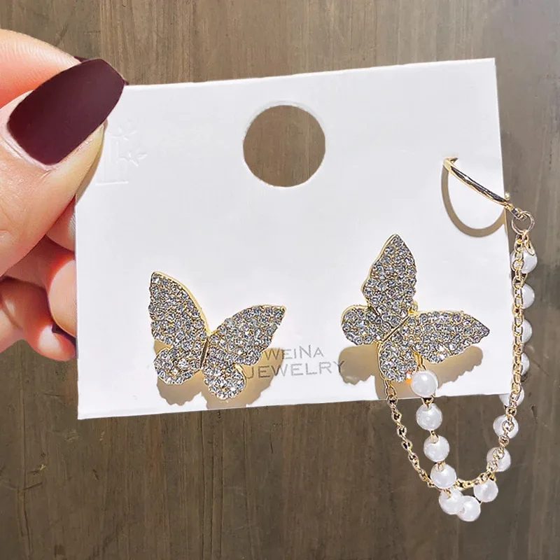 Eleganckie asymetryczne Rhinestone Butterfly Drop kolczyki dla kobiet dziewczynki śliczne modne perły kolczyki z łańcuszka koreańska biżuteria