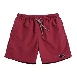 Pantaloni Casual traspiranti ad asciugatura rapida da uomo tasche da spiaggia pantaloncini sportivi in tinta unita pantaloncini da jogging corti da uomo pantalone pantaloncini da palestra estivi