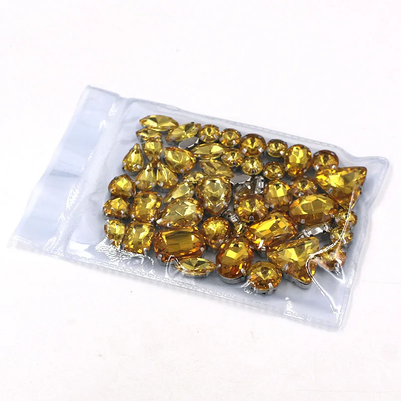 Sell at a loss! 50pcs/bag  mixed shape golden yellow sew on glass crystal rhinestones diy clothing accessories