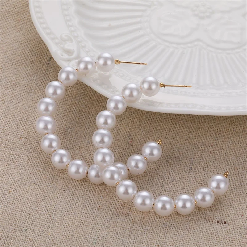 Женские серьги-кольца с белым жемчугом