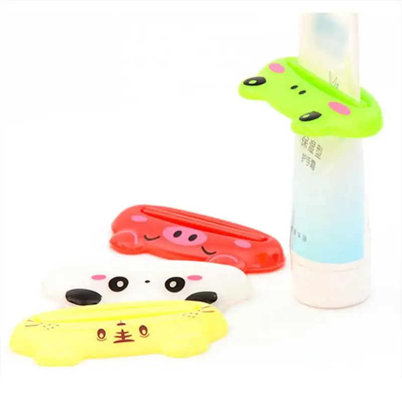 Presse-dentifrice de dessin animé, porte-tube, ensemble de pressage T1, clip pour enfants, distributeur facile, aléatoire, 1 pièce